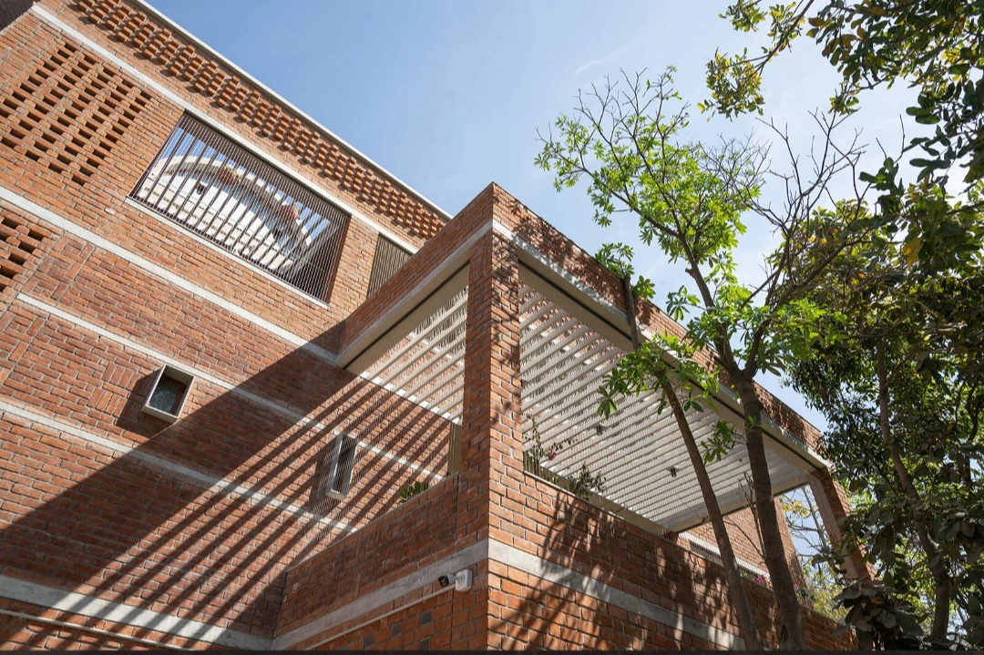 Expert Exposed Brick work execution on a residential site in Ahmedabad by Rajiv Builders.